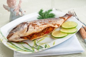 Дорада, фаршированная овощами